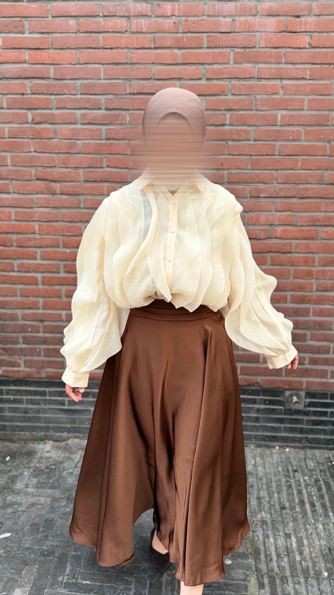 Flowy shirt with voluminous sleeves