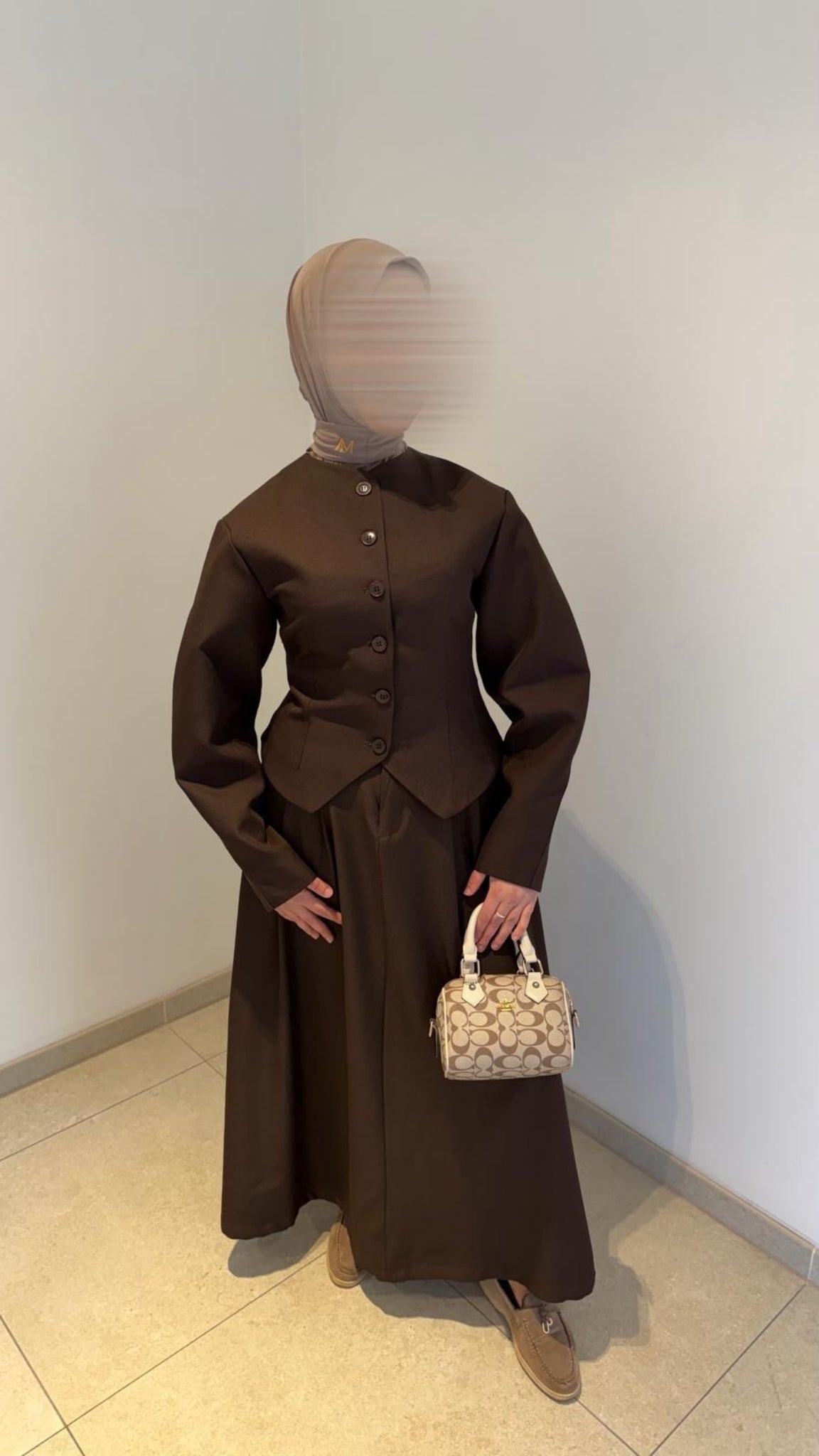 Gilet cintré boutonné