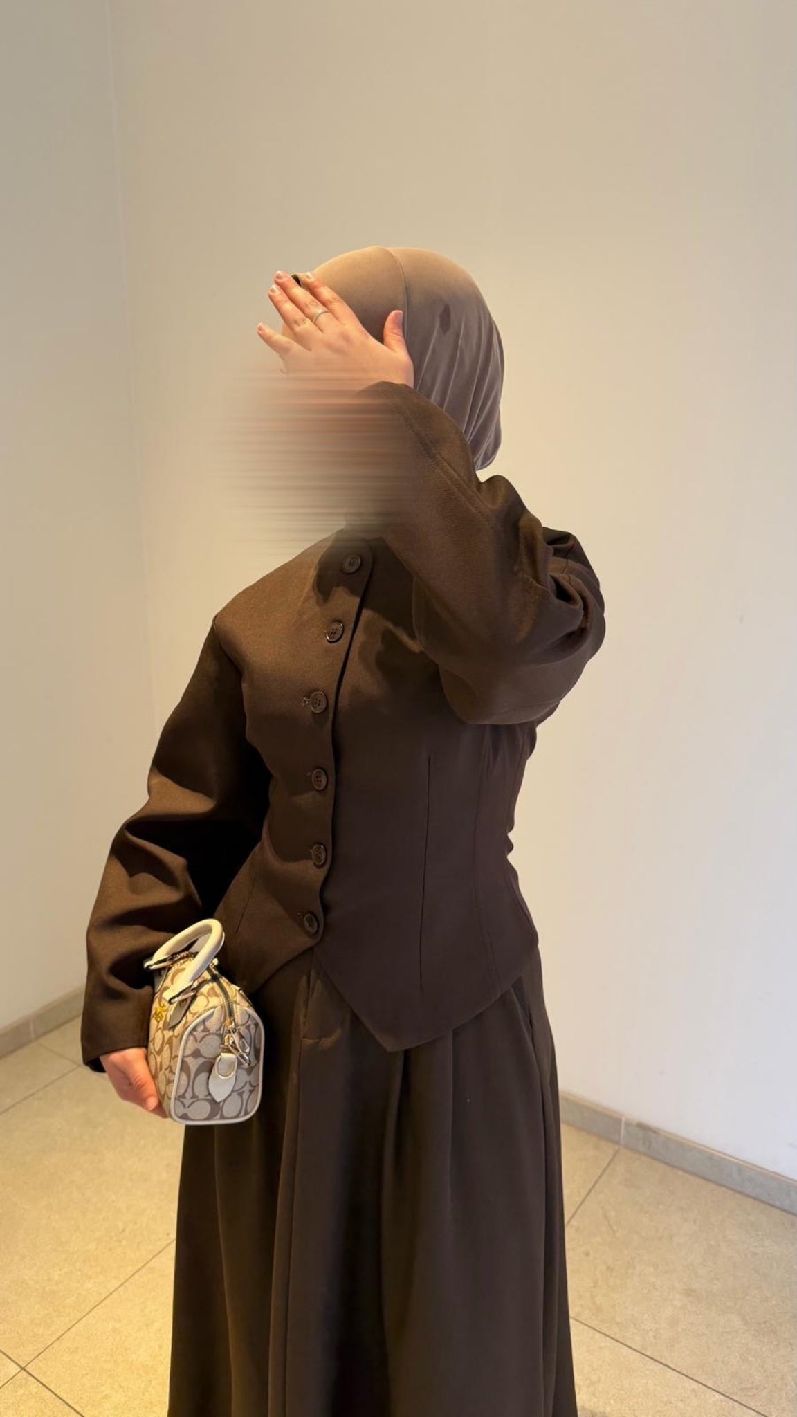 Gilet cintré boutonné