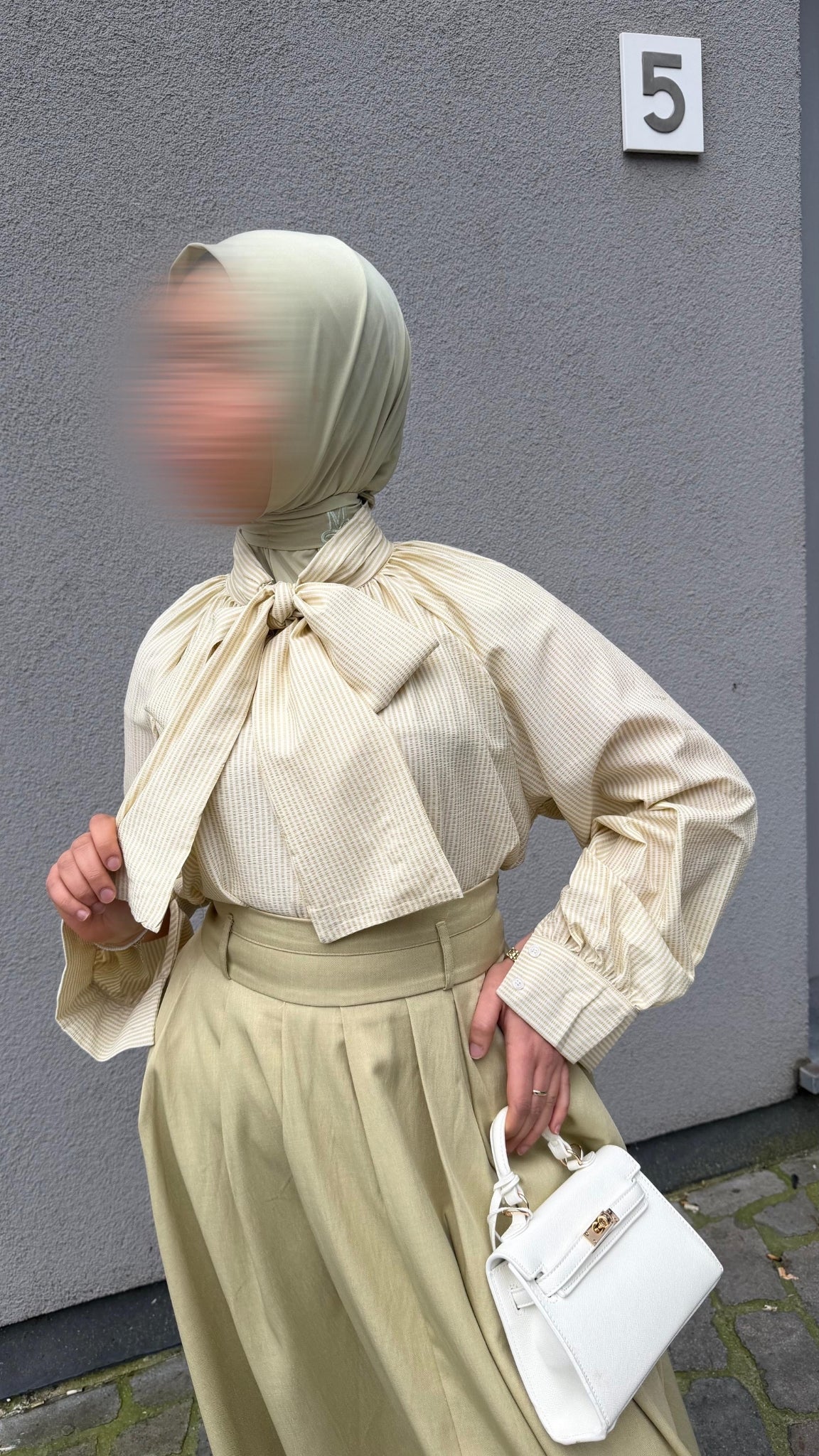 Flowy blouse with a bow