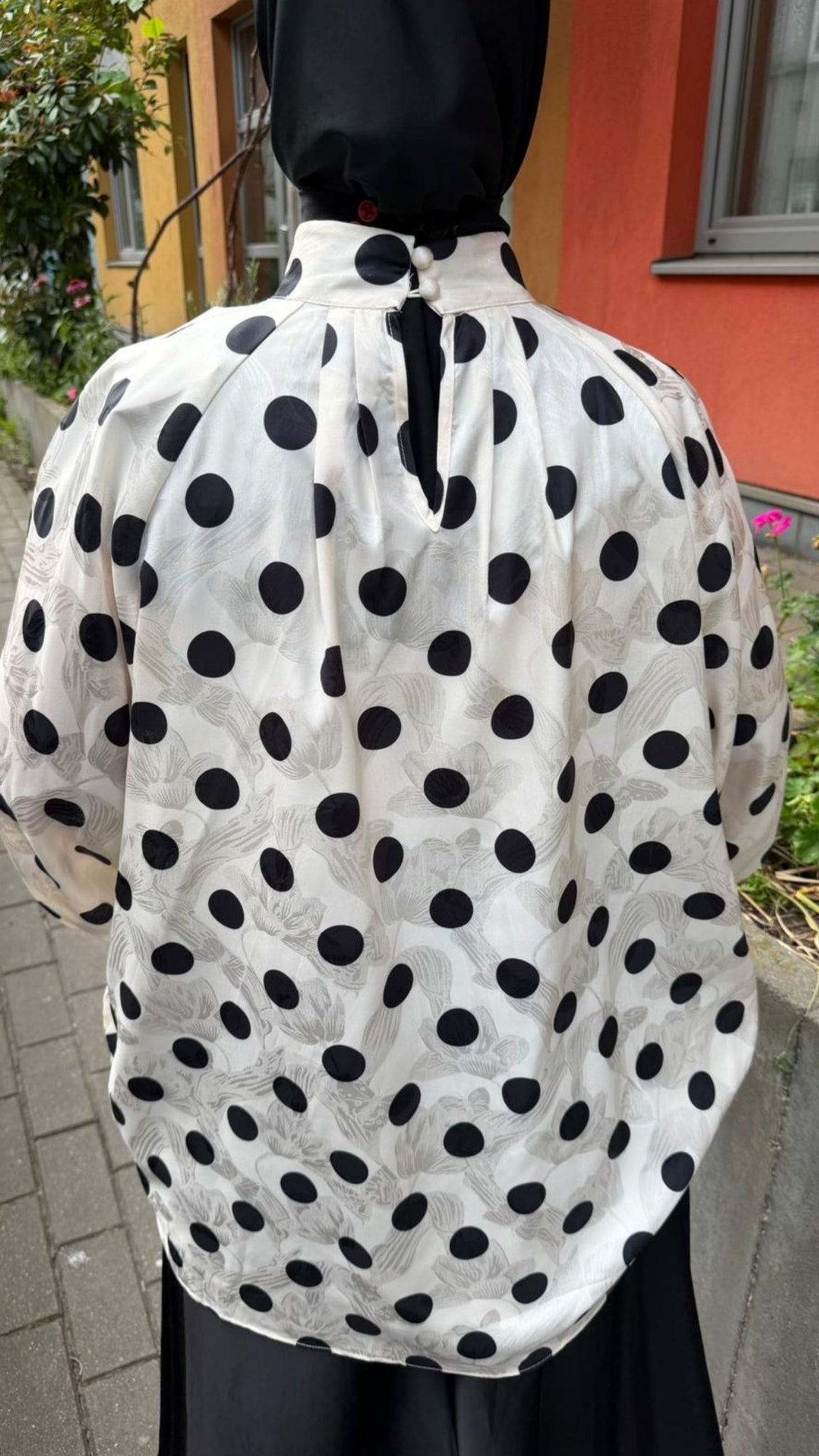 Oversized polka dot blouse with draped collar