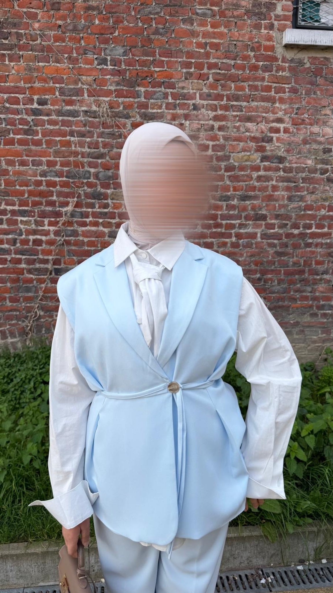 Long blazer with a tie belt