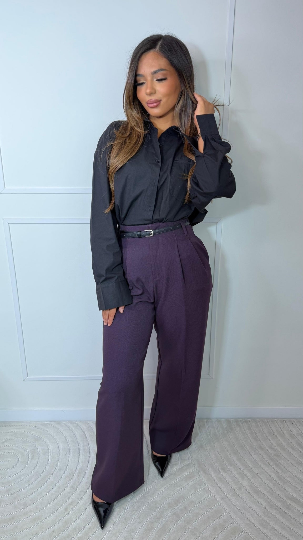 High-waisted tailored trousers with pleats