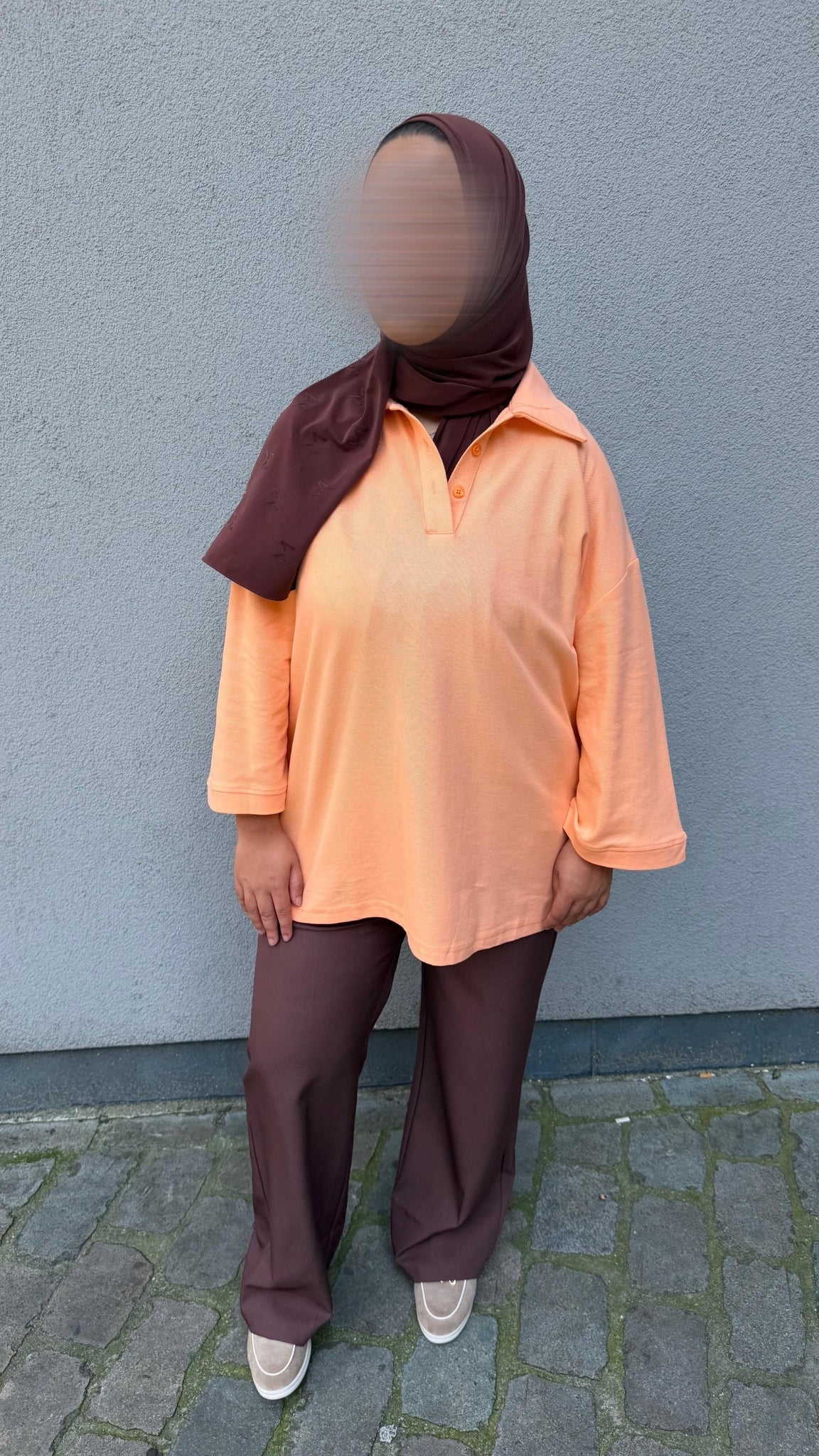 Loose-fit button-down polo shirt
