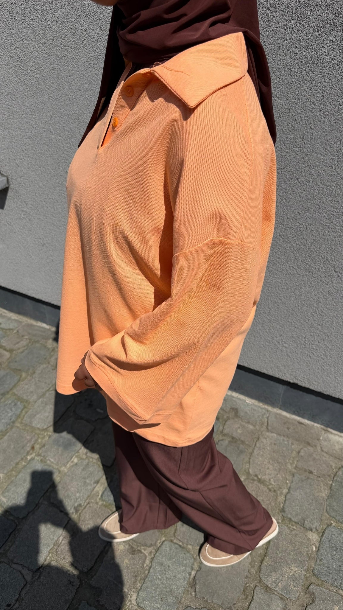 Loose-fit button-down polo shirt