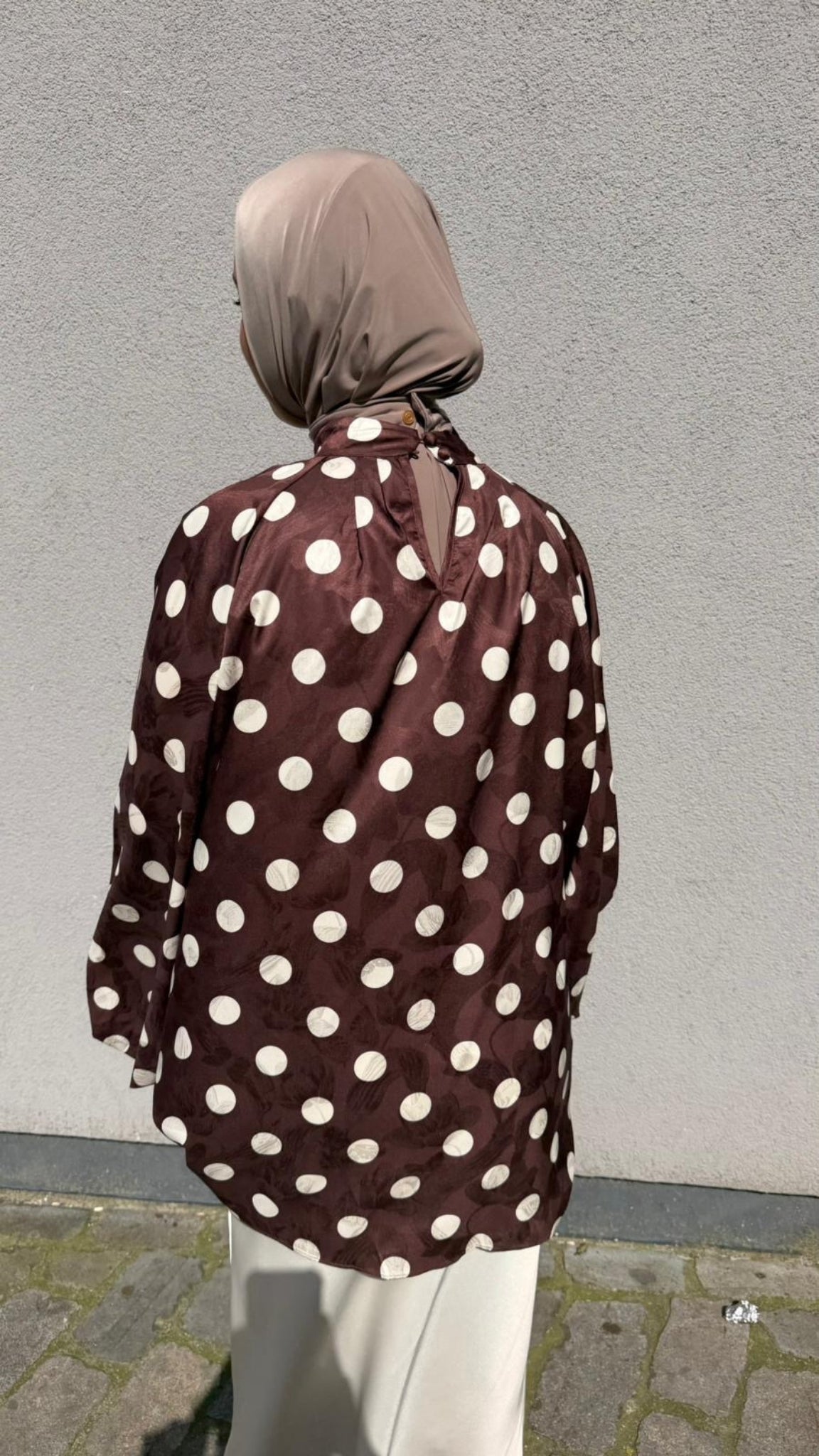 Oversized polka dot blouse with draped collar