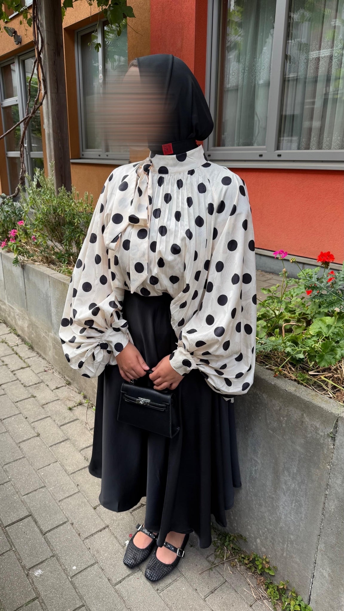 Oversized polka dot blouse with draped collar