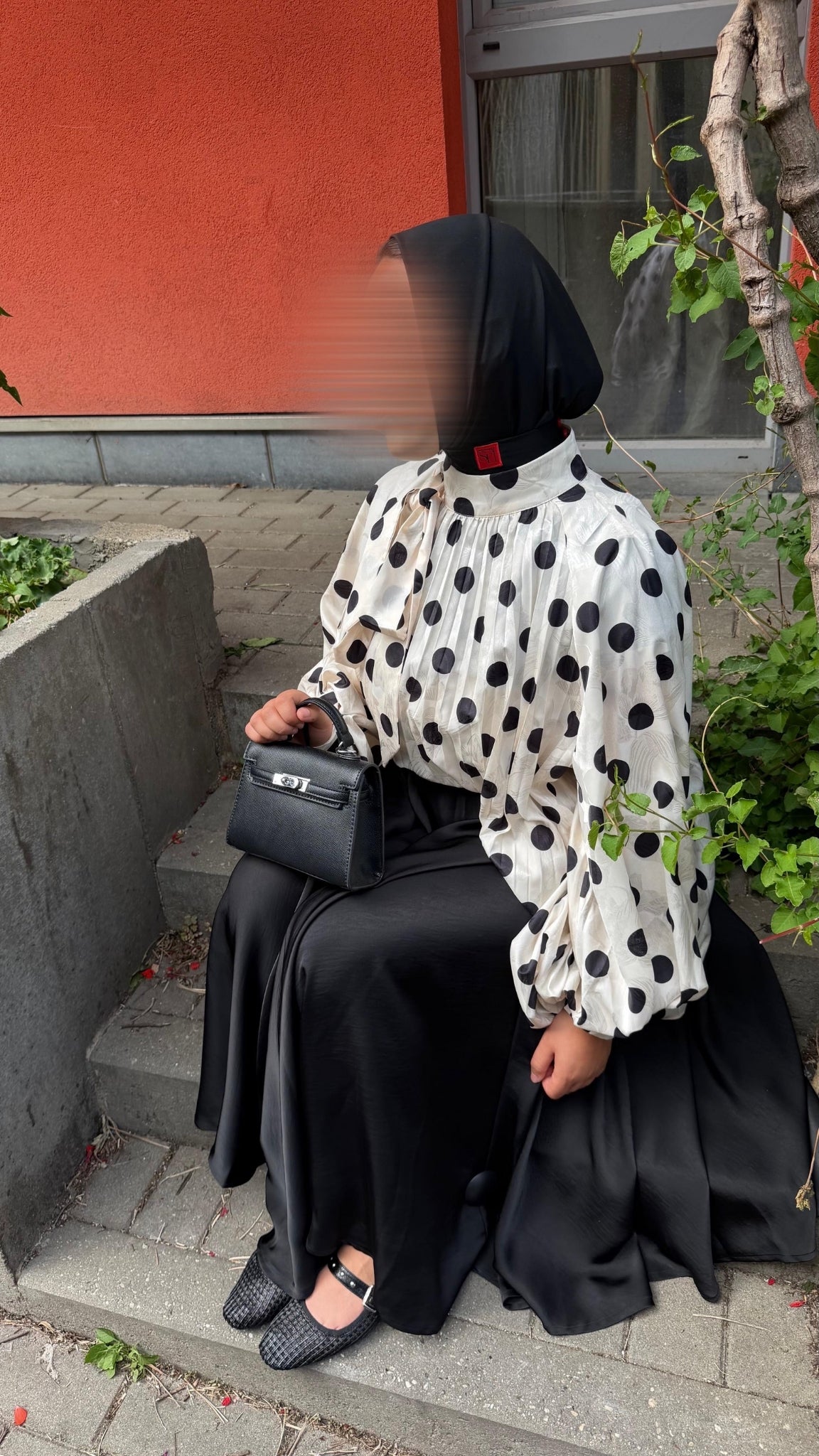 Oversized polka dot blouse with draped collar