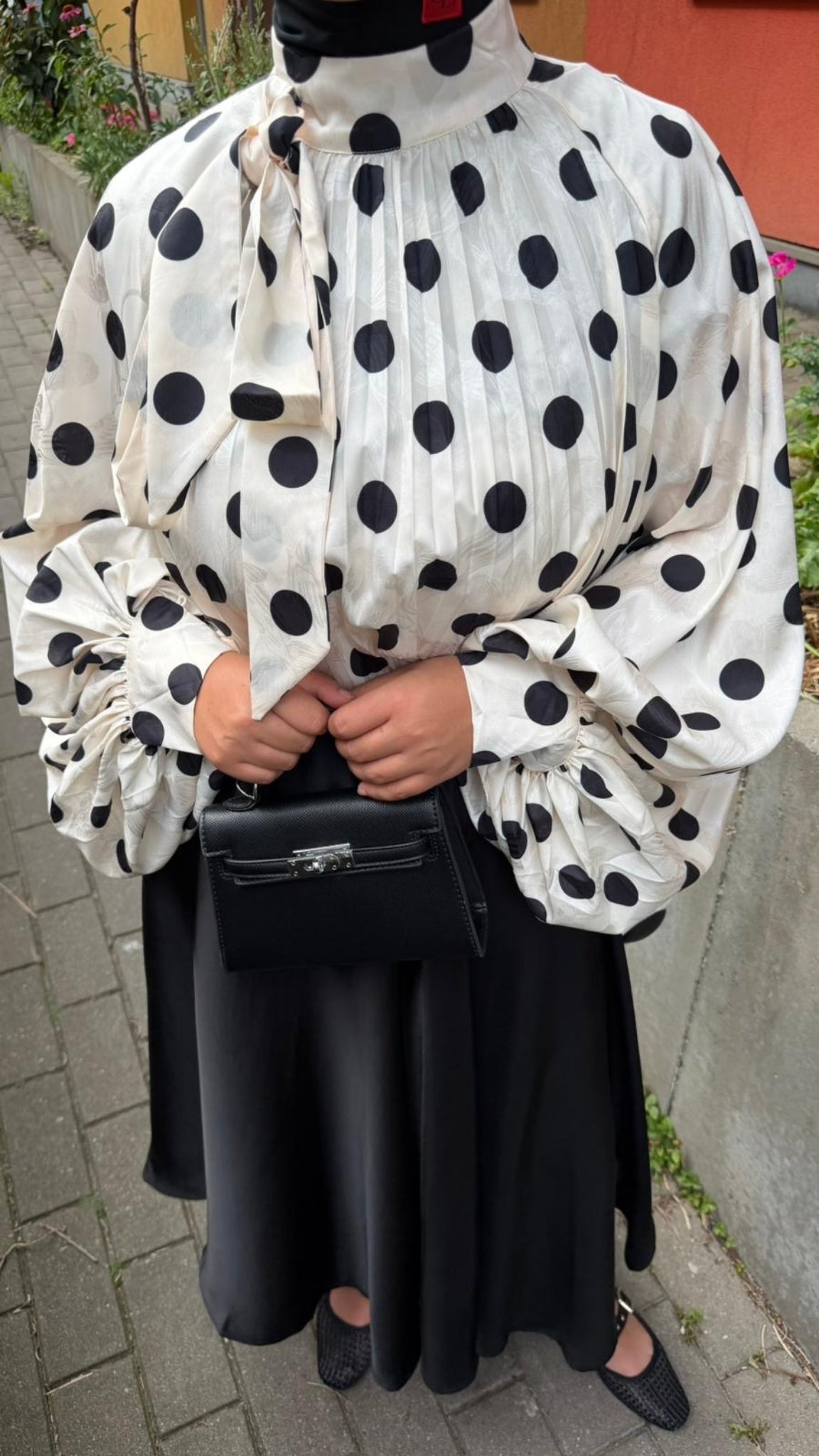 Oversized polka dot blouse with draped collar