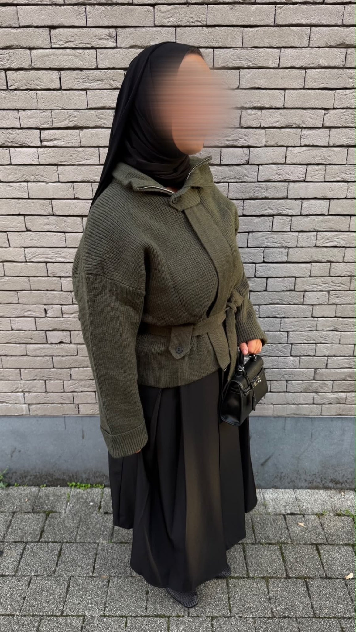 Pull zippé ceinturé