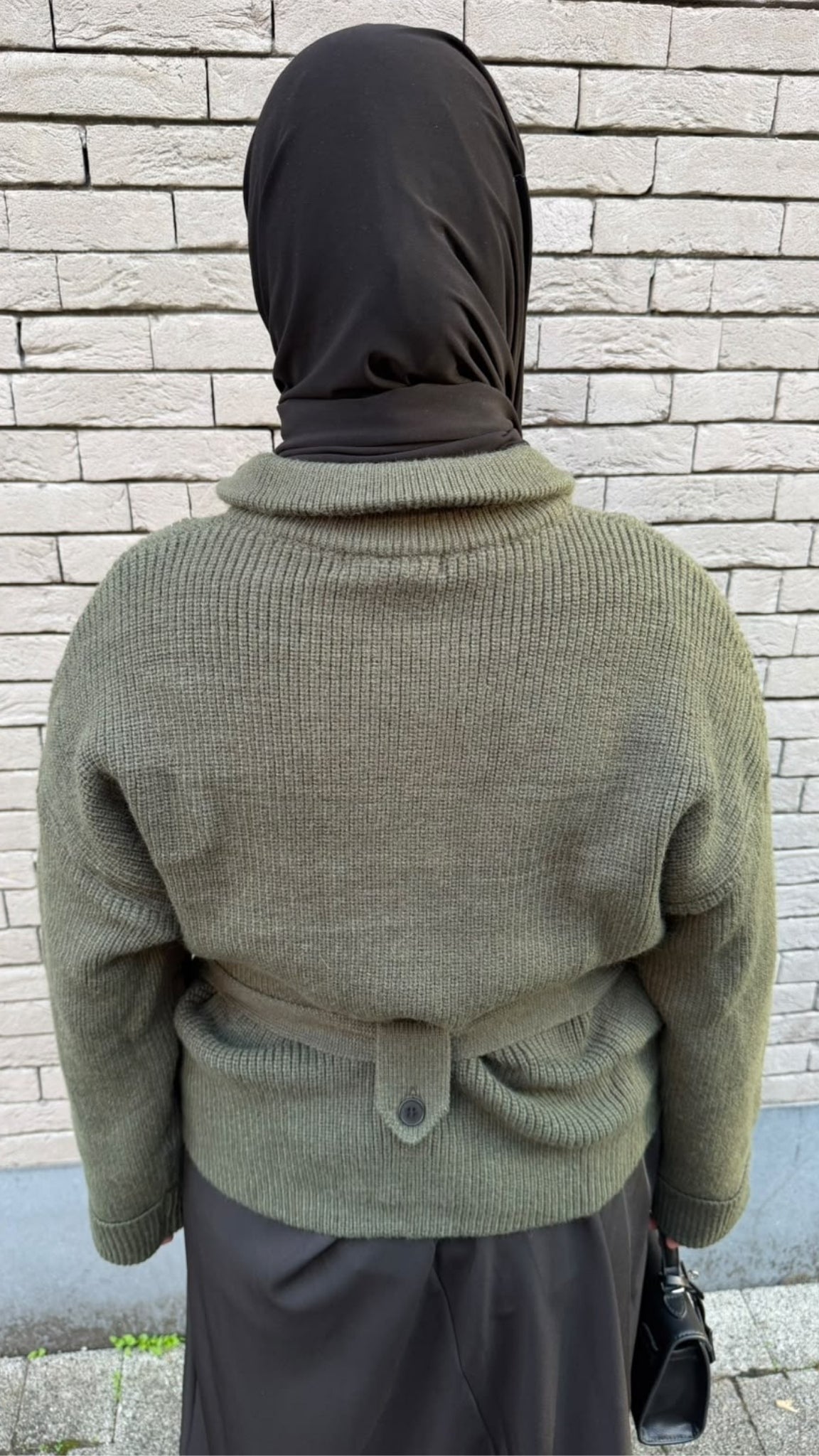 Pull zippé ceinturé