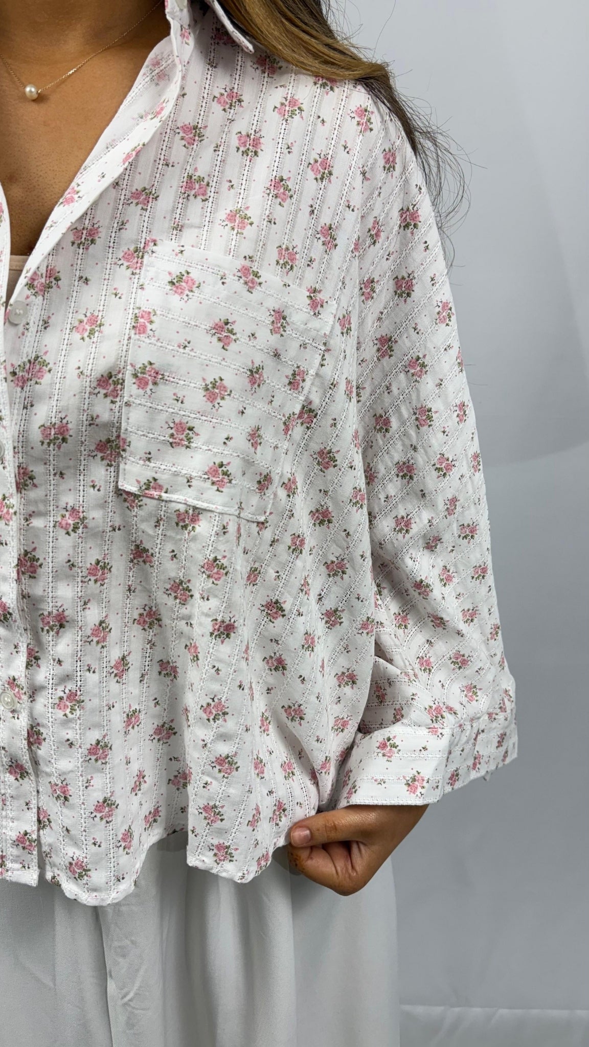 Flared asymmetric floral blouse